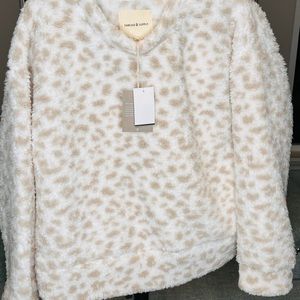 Sweater size small by tread & supply , color white leoprd